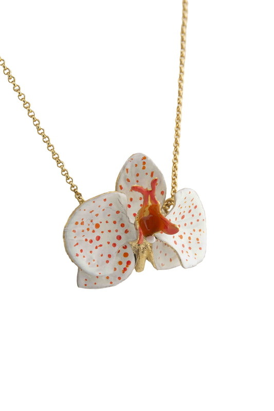 Handcrafted in Tuscany, the Marri Cortona Orchidea Necklace in 18k gold bronze captures the orchid’s grace — elegant, hand-enameled, and timelessly Italian.