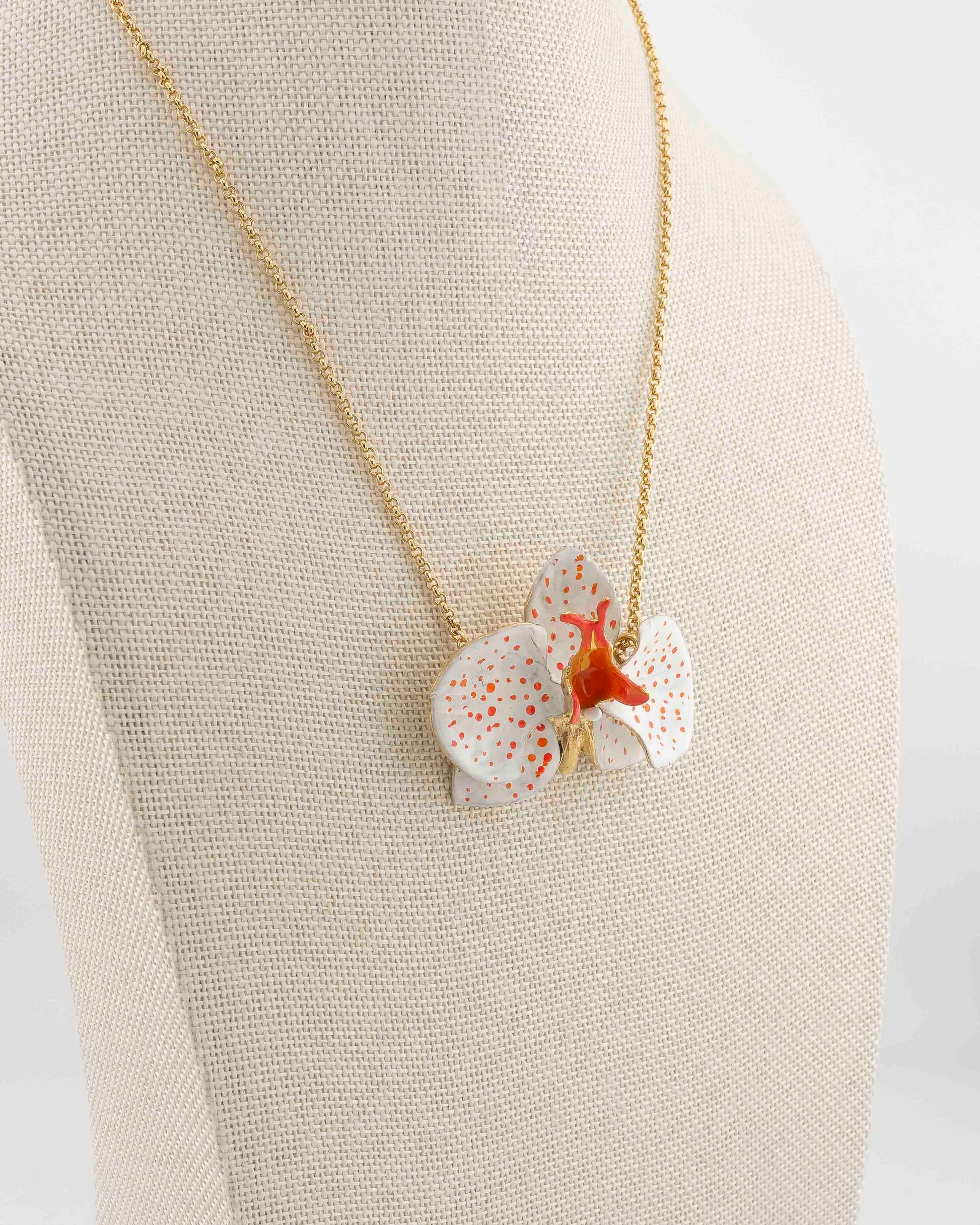 Handcrafted in Tuscany, the Marri Cortona Orchidea Necklace in 18k gold bronze captures the orchid’s grace — elegant, hand-enameled, and timelessly Italian.