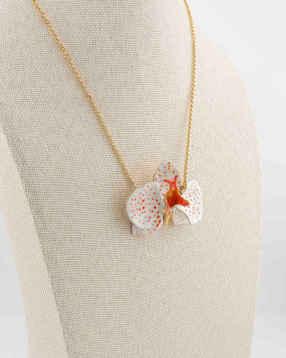 Handcrafted in Tuscany, the Marri Cortona Orchidea Necklace in 18k gold bronze captures the orchid’s grace — elegant, hand-enameled, and timelessly Italian.