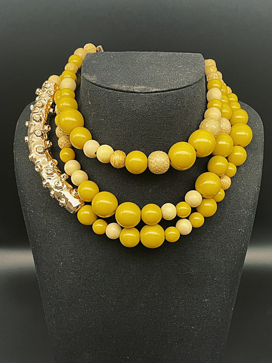 Collana Octopus con elementi  in vera pelle di pitone, legno e resina