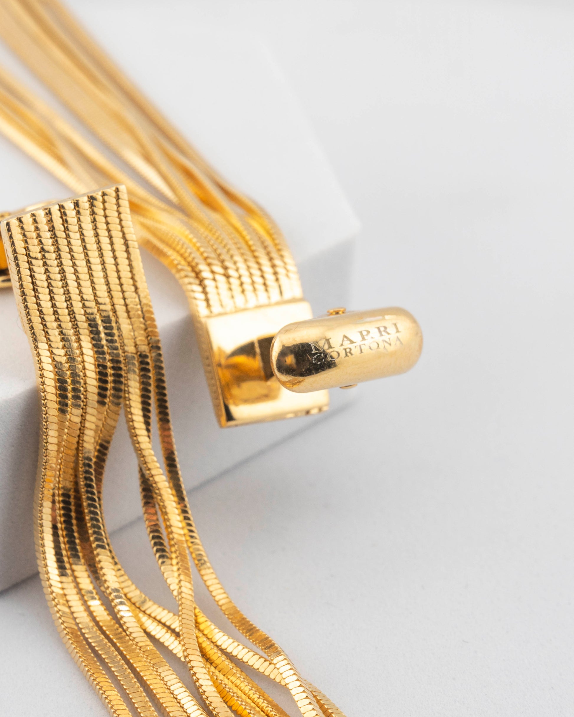 Handcrafted in Tuscany, the MarriCortona Voilà Cufflinks in 18k gold bronze blend Italian artistry and bold design — elegance redefined with modern flair.