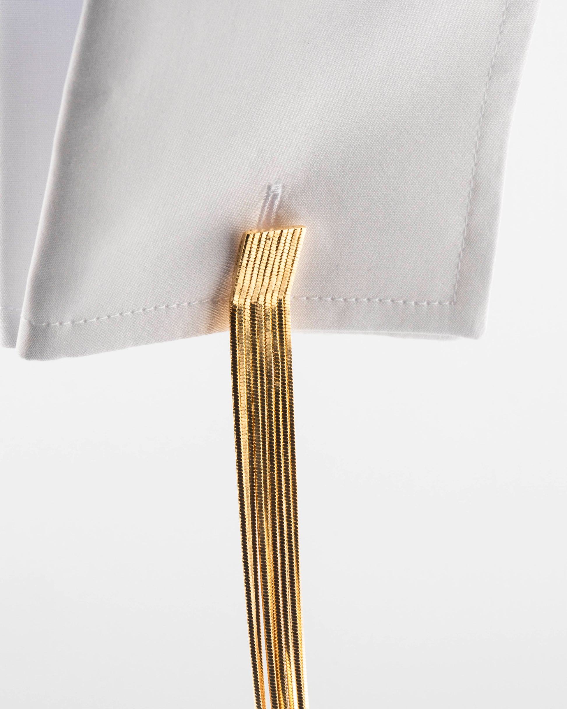 Handcrafted in Tuscany, the MarriCortona Voilà Cufflinks in 18k gold bronze blend Italian artistry and bold design — elegance redefined with modern flair.