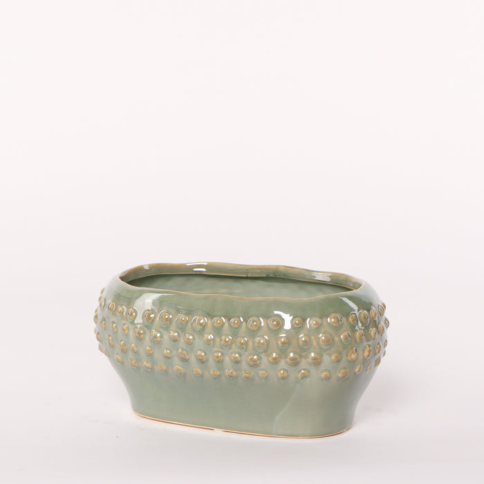 Cachpot for flowers, oval, in light pastel green ceramic