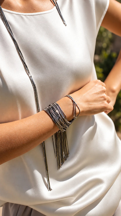 Pulsera 'Voila' baño oro negro. Se adapta a muñecas de hasta 17 cm. Talla S