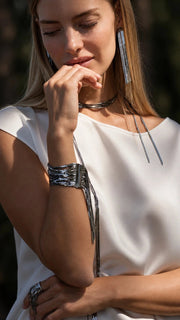 Pulsera 'Voila' baño oro negro. Se adapta a muñecas de hasta 17 cm. Talla S