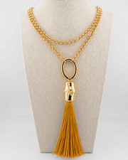 Collana con elemento di bamboo e nappa di seta Curcuma