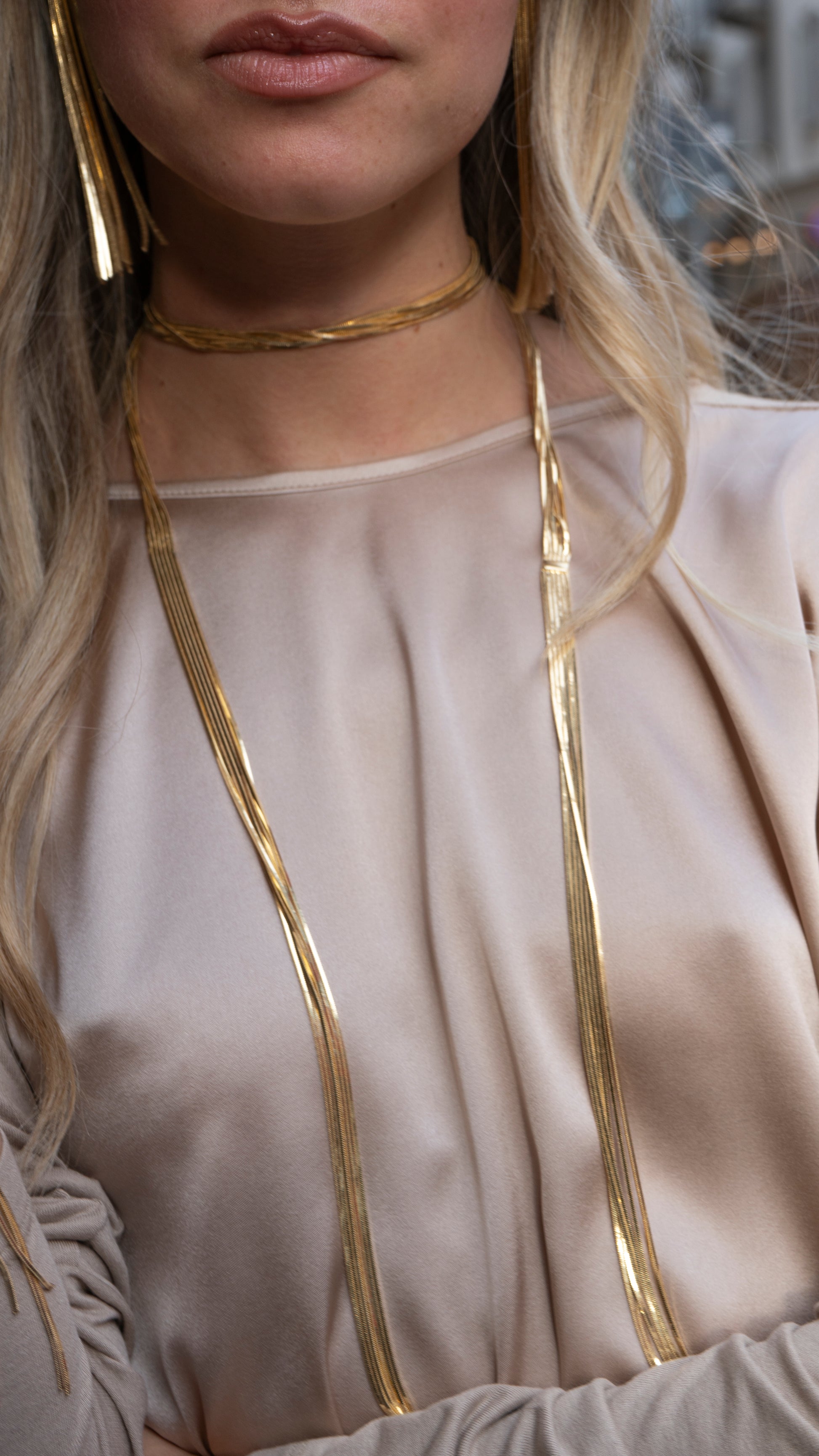 Handcrafted in Tuscany, the MarriCortona Voilà Necklace in bronze18k gold plated features 6 luminous strands — a versatile icon of modern Italian elegance.