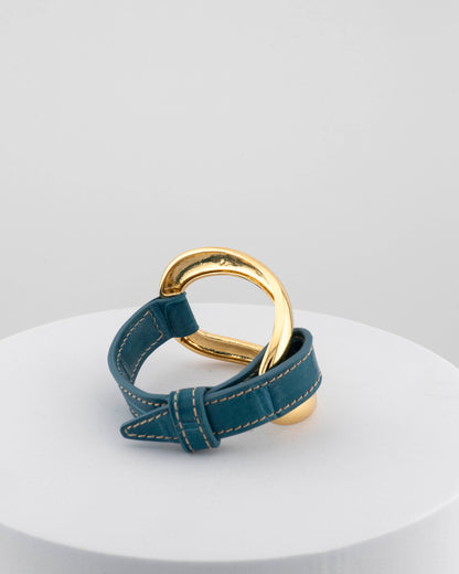 Handcrafted 18K gold-plated bronze bracelet with genuine crocodile leather strap.
An original Marri Cortona design — handmade in Tuscany.