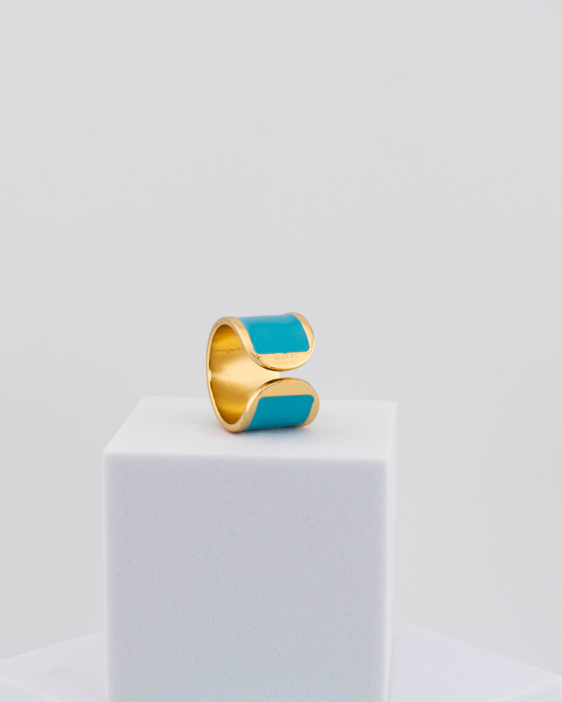 Handcrafted in Tuscany, the MarriCortona Smalto Rings combine 18k gold and hand-painted enamel — vibrant, refined, and authentically Made in Italy.