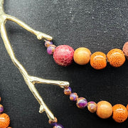 Branch necklace with wooden, python and ceramic beads