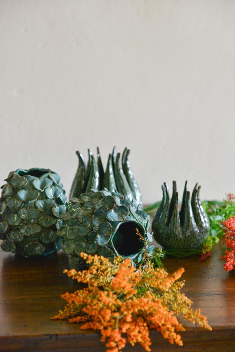 Ceramic vase with leaves