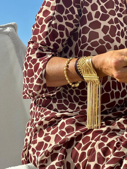 Handcrafted in Tuscany, the MarriCortona Voilà Bracelet in 18k black gold-plated bronze exudes movement, elegance, and bold Italian contemporary style.