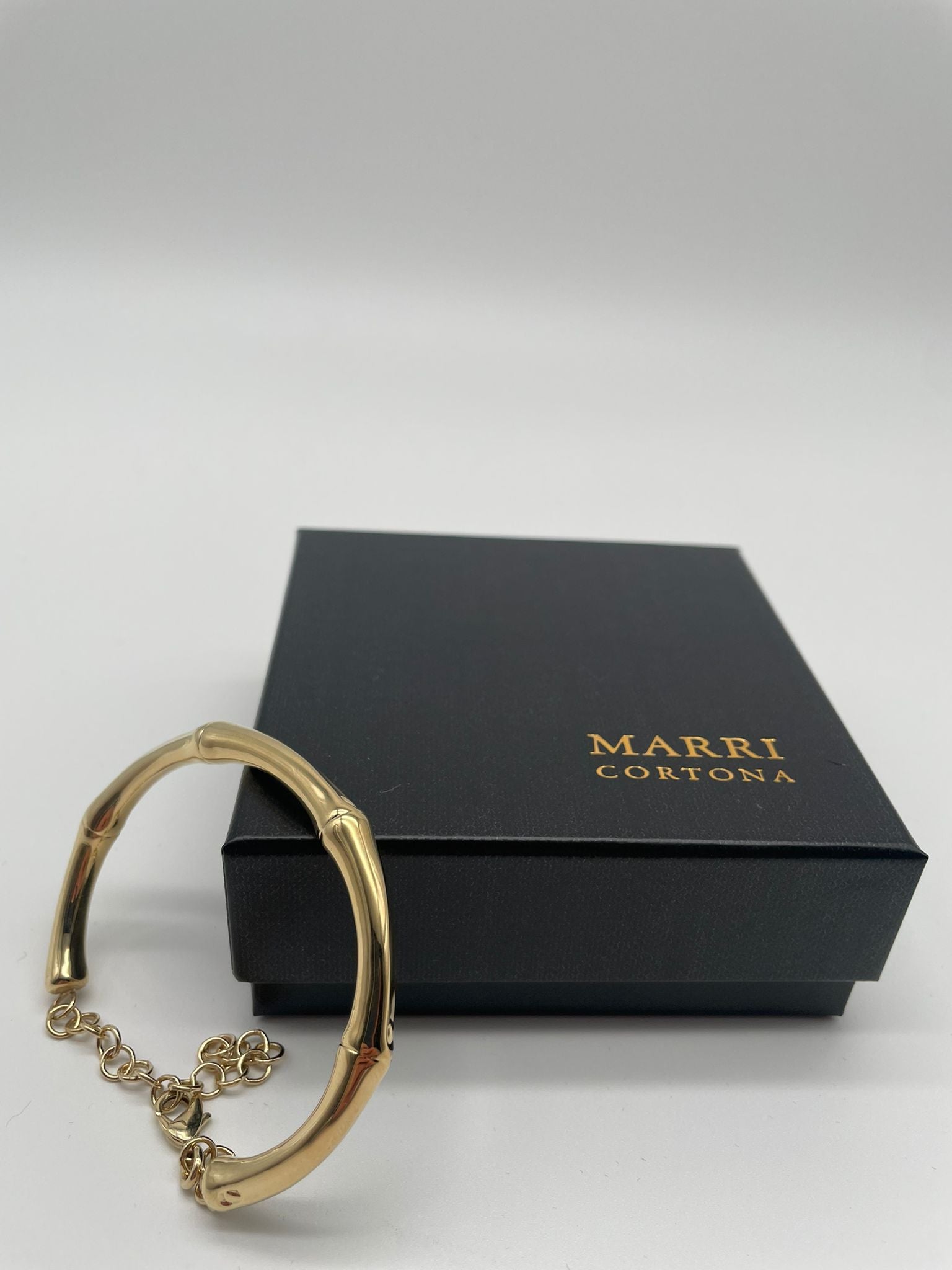 The Bangle Bamboo Bracelet by Marri Cortona, handcrafted in Tuscany, combines lightness, gold elegance, and modern design in timeless Italian style