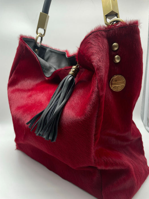 Bag in colored cowhide, red.