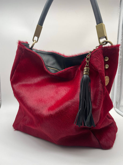 Bag in colored cowhide, red.