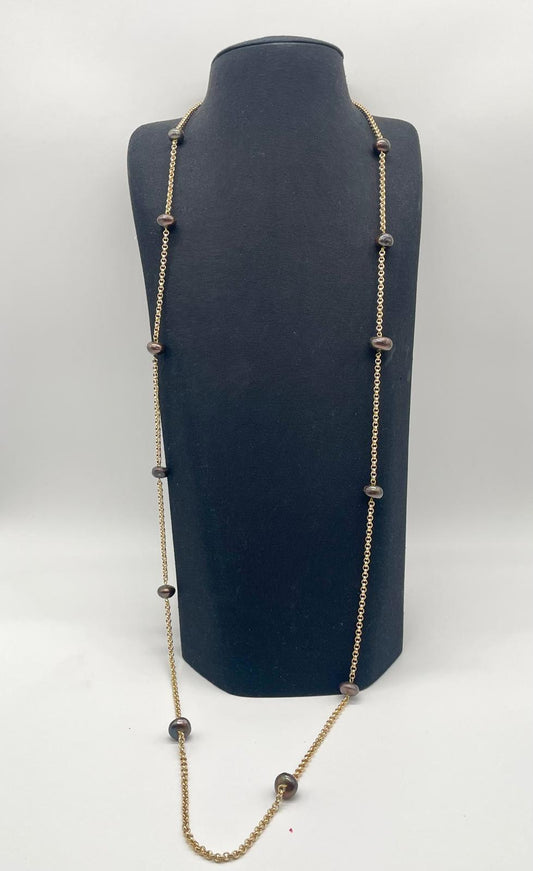 Necklace with purple gray pearls