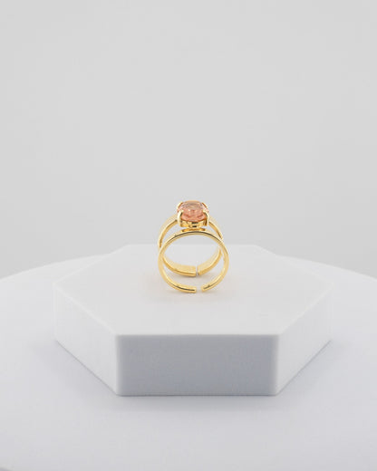 Handcrafted ring in 18K gold-plated bronze with a luminous central crystal.
Designed by Marri Cortona and handmade in Tuscany — pure elegance and light.