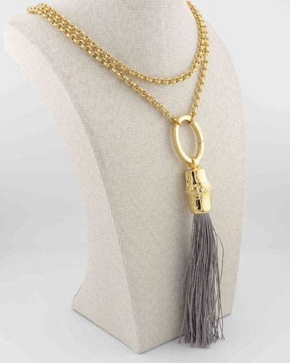 Handcrafted in Tuscany, the Bamboo and Silk Tassel Necklace by Marri Cortona blends nature and elegance in a timeless expression of Italian craftsmanship.