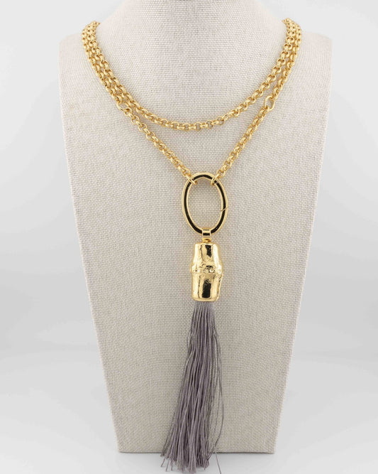 Handcrafted in Tuscany, the Bamboo and Silk Tassel Necklace by Marri Cortona blends nature and elegance in a timeless expression of Italian craftsmanship.