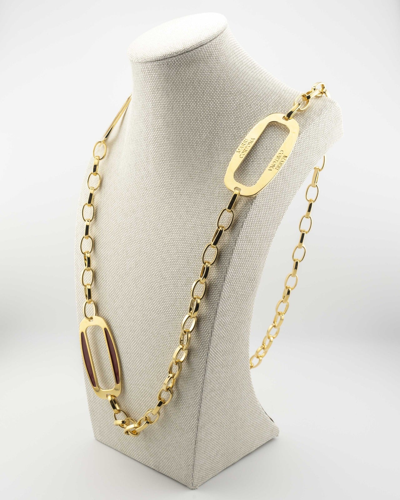 Handcrafted in Tuscany, the MarriCortona Smalto Ellipse Necklace in 18k gold and hand-painted enamel embodies Italian elegance, light, and timeless design.