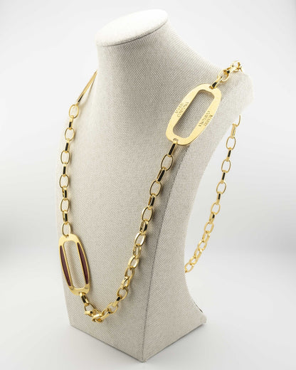 Handcrafted in Tuscany, the MarriCortona Smalto Ellipse Necklace in 18k gold and hand-painted enamel embodies Italian elegance, light, and timeless design.