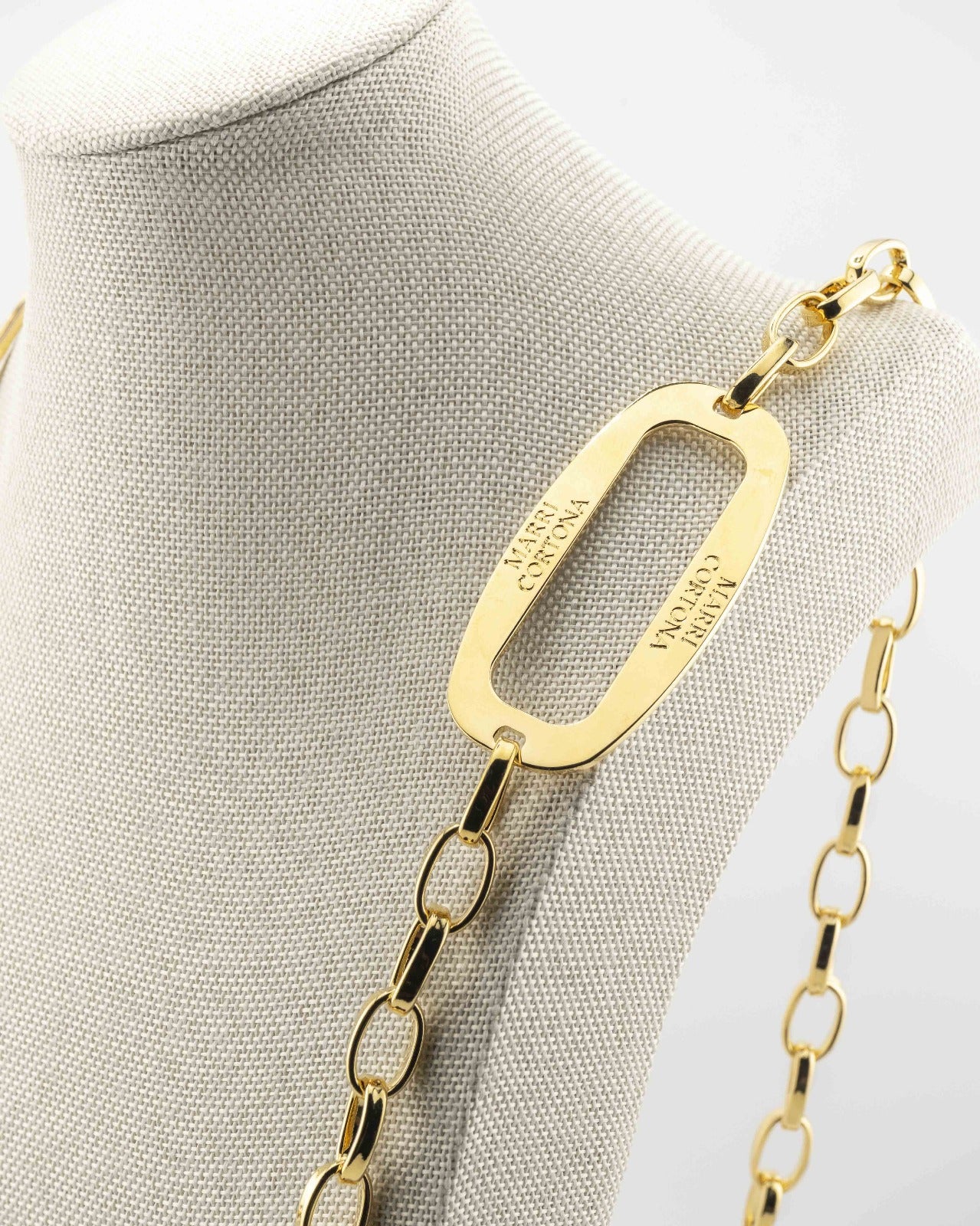 Handcrafted in Tuscany, the MarriCortona Smalto Ellipse Necklace in 18k gold and hand-painted enamel embodies Italian elegance, light, and timeless design.