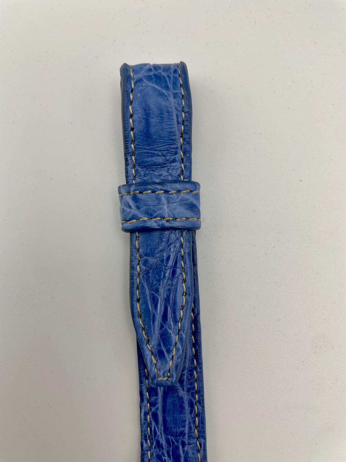 Handcrafted 18K gold-plated bronze bracelet with genuine crocodile leather strap.
An original Marri Cortona design — handmade in Tuscany.