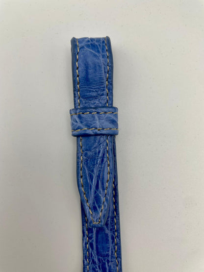 Handcrafted 18K gold-plated bronze bracelet with genuine crocodile leather strap.
An original Marri Cortona design — handmade in Tuscany.