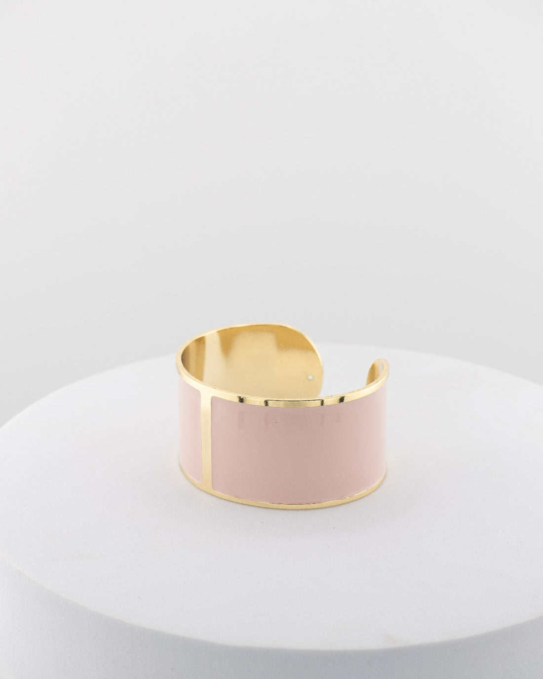 Handcrafted in Tuscany, the MarriCortona Smalto Bracelets in 18k gold and hand-painted enamel feature bold 30 mm bands — radiant, elegant, and uniquely Italian.