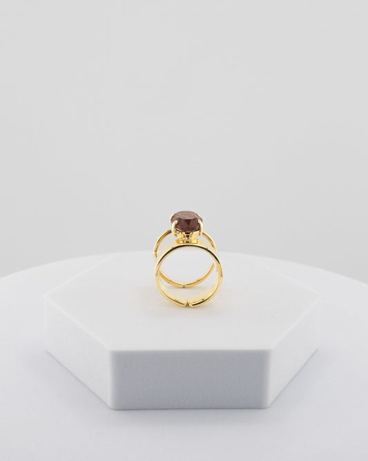 Handcrafted ring in 18K gold-plated bronze with a luminous central crystal.
Designed by Marri Cortona and handmade in Tuscany — pure elegance and light.