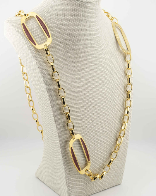 Handcrafted in Tuscany, the MarriCortona Smalto Ellipse Necklace in 18k gold and hand-painted enamel embodies Italian elegance, light, and timeless design.