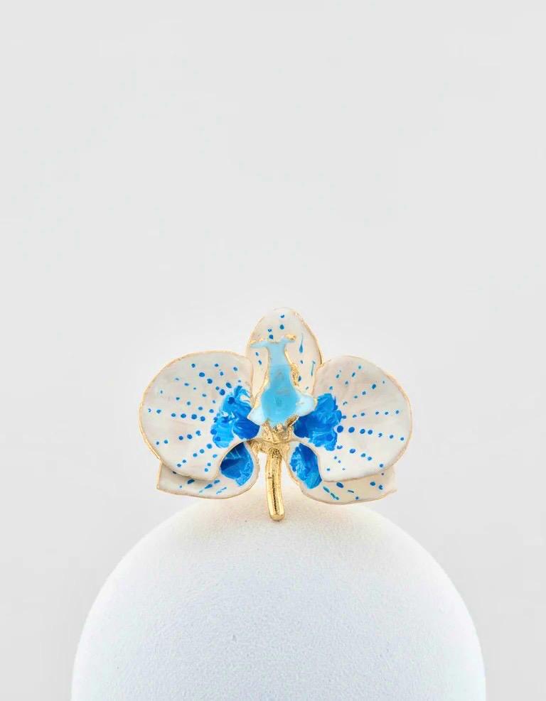 Handcrafted in Tuscany, the Marri Cortona Orchidea Ring in 18k gold bronze captures the orchid’s grace — unique, hand-enameled, and timelessly elegant.