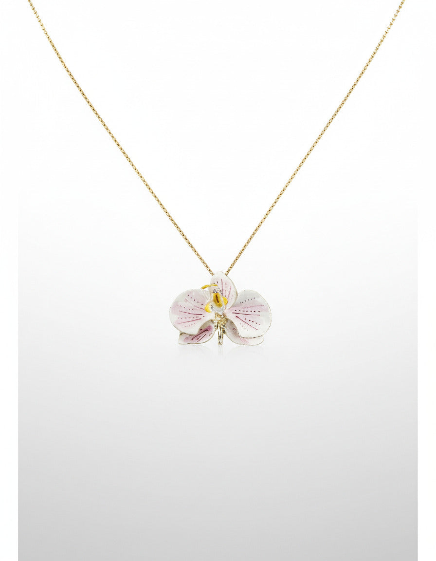 Handcrafted in Tuscany, the Marri Cortona Orchidea Necklace in 18k gold bronze captures the orchid’s grace — elegant, hand-enameled, and timelessly Italian.