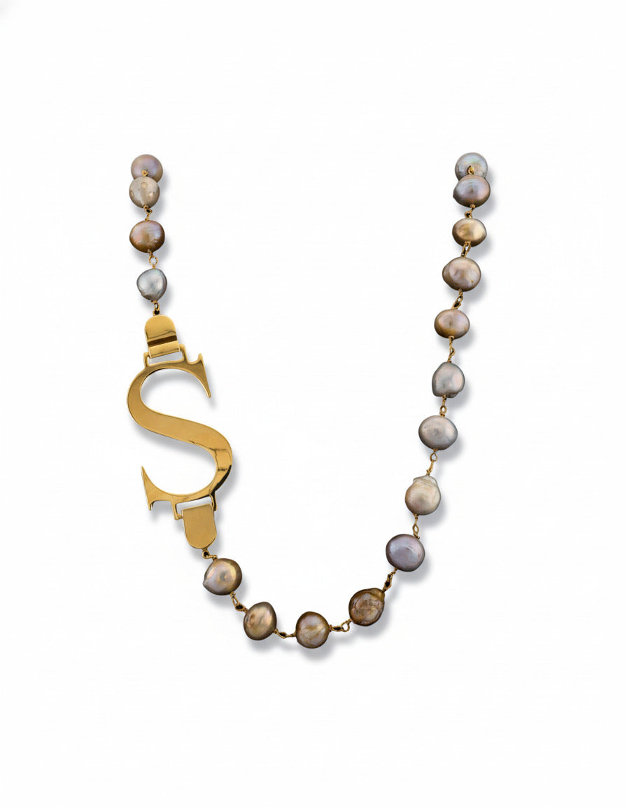 Handcrafted in Tuscany, the Marri Cortona Mia Necklace with freshwater pearls and personalized initial reimagines the classic pearl with modern Italian elegance.