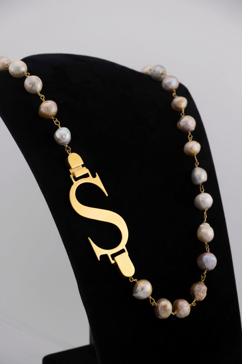 Handcrafted in Tuscany, the Marri Cortona Mia Necklace with freshwater pearls and personalized initial reimagines the classic pearl with modern Italian elegance.