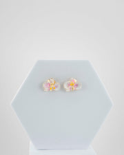 Handcrafted in Tuscany, the Marri Cortona Orchidea Earrings in 18k gold bronze are hand-enameled jewels that blend light, artistry, and timeless elegance.