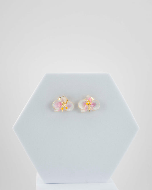 Handcrafted in Tuscany, the Marri Cortona Orchidea Earrings in 18k gold bronze are hand-enameled jewels that blend light, artistry, and timeless elegance.