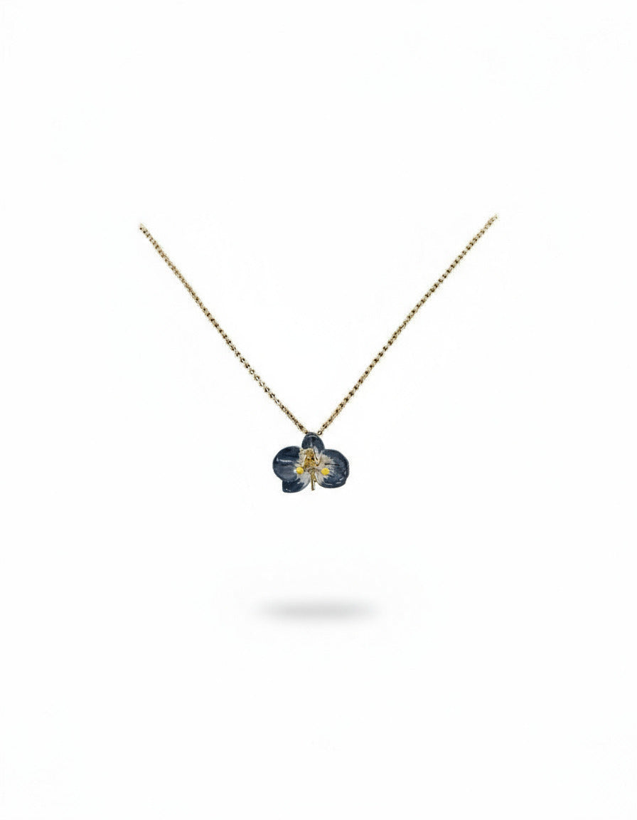 Handcrafted in Tuscany, the Marri Cortona Orchidea Necklace in 18k gold bronze captures the orchid’s grace — elegant, hand-enameled, and timelessly Italian.