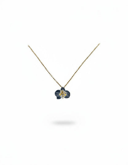 Handcrafted in Tuscany, the Marri Cortona Orchidea Necklace in 18k gold bronze captures the orchid’s grace — elegant, hand-enameled, and timelessly Italian.