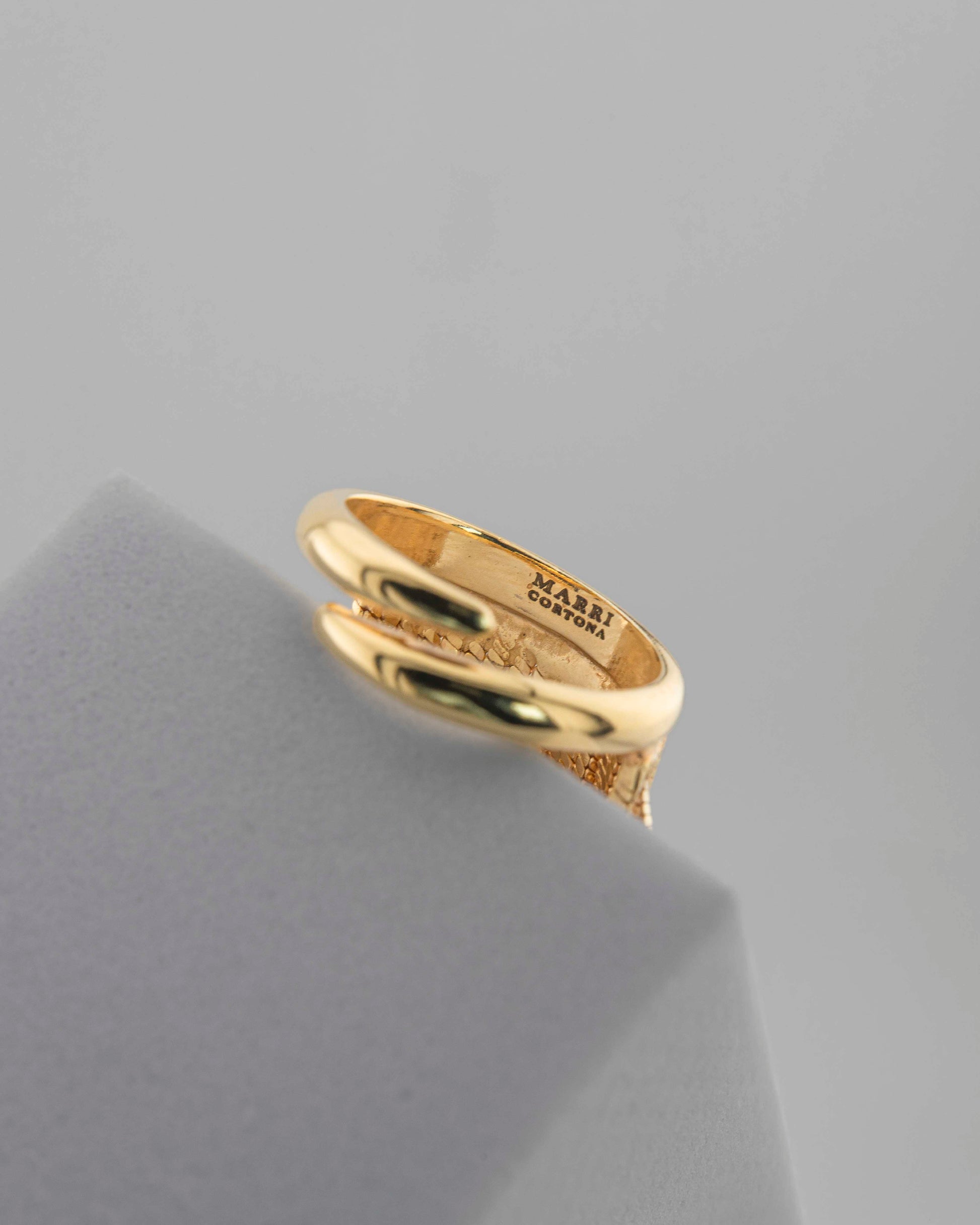 Handcrafted in Tuscany, the MarriCortona Voilà Ring in bronze 18k gold plated blends bold design and elegance — a statement of modern Italian artistry and allure.