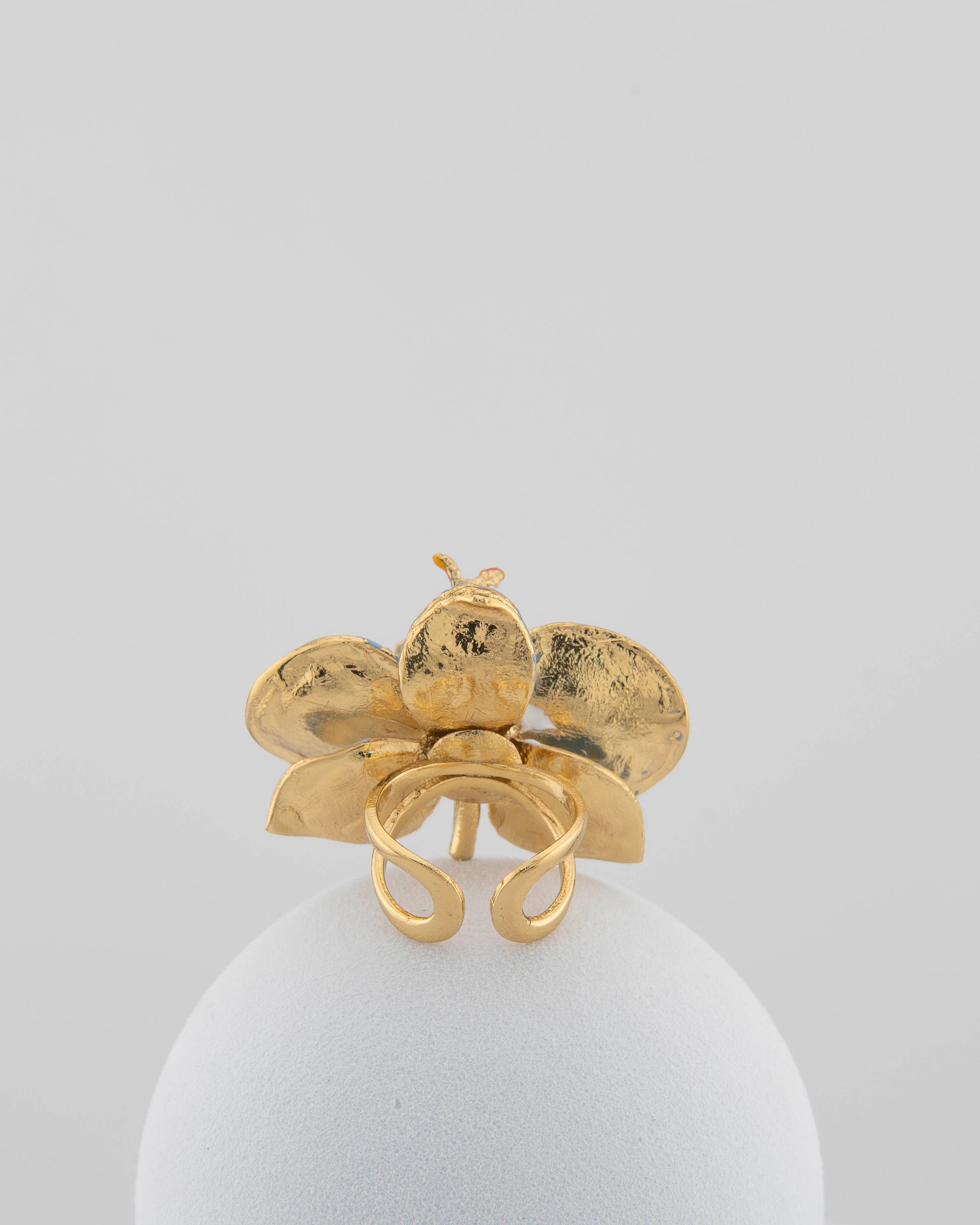 Handcrafted in Tuscany, the Marri Cortona Orchidea Ring in 18k gold bronze captures the orchid’s grace — unique, hand-enameled, and timelessly elegant.