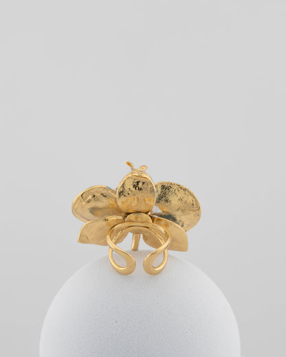 Handcrafted in Tuscany, the Marri Cortona Orchidea Ring in 18k gold bronze captures the orchid’s grace — unique, hand-enameled, and timelessly elegant.