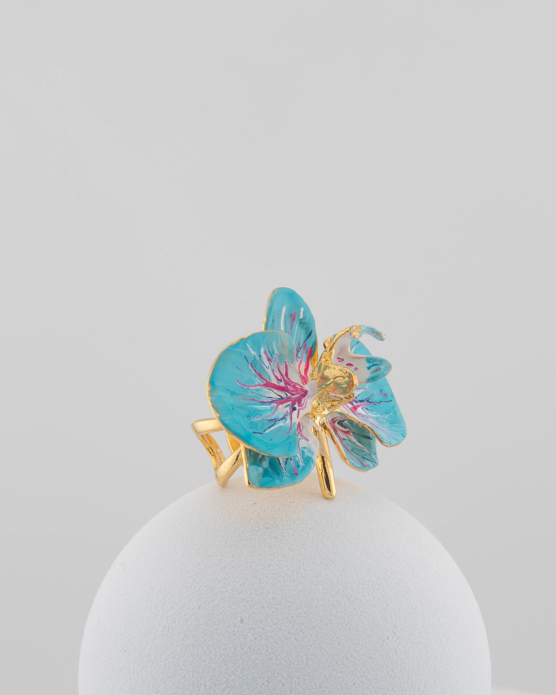 Handcrafted in Tuscany, the Marri Cortona Orchidea Ring in 18k gold bronze captures the orchid’s grace — unique, hand-enameled, and timelessly elegant.