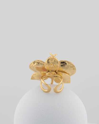 Handcrafted in Tuscany, the Marri Cortona Orchidea Ring in 18k gold bronze captures the orchid’s grace — unique, hand-enameled, and timelessly elegant.