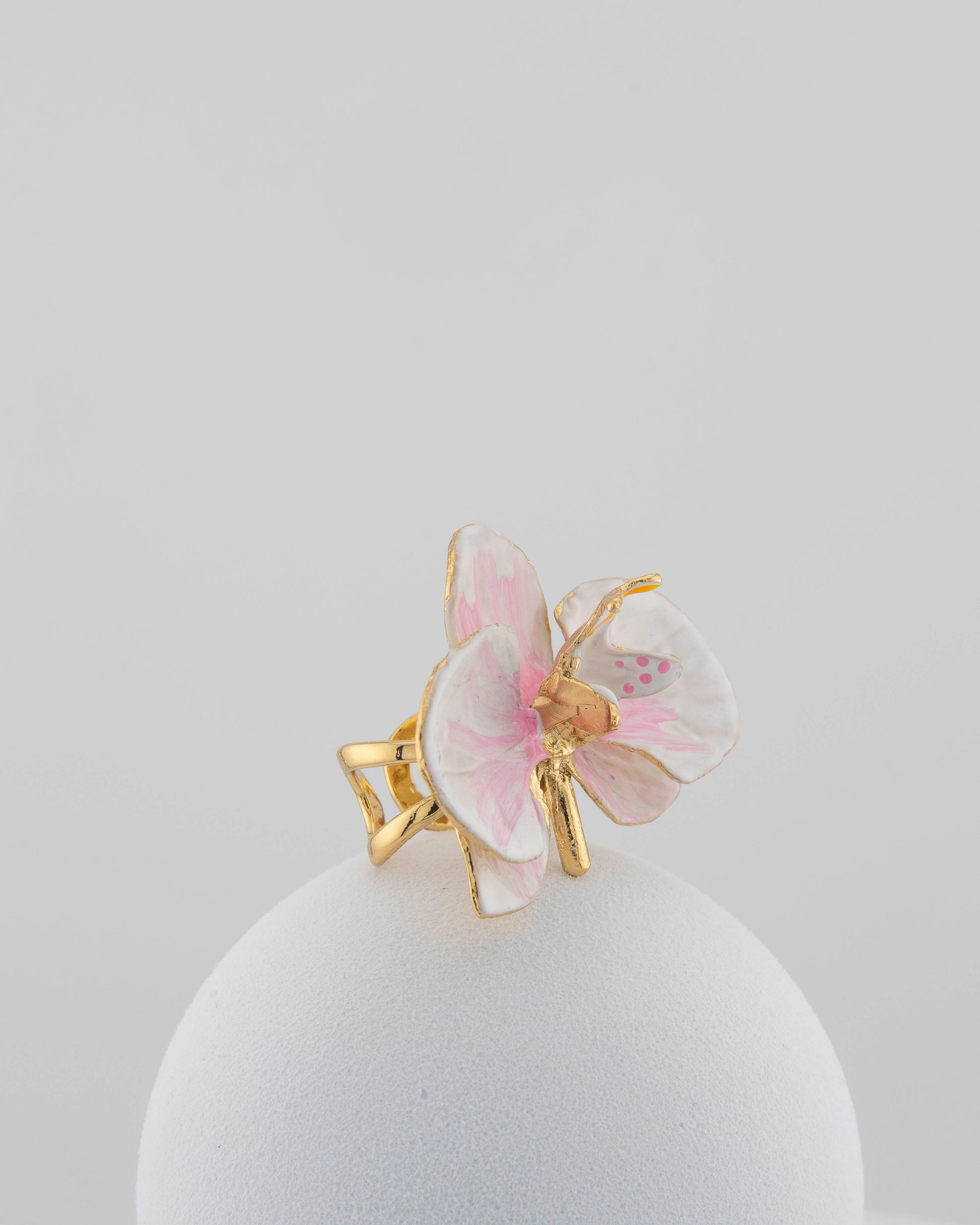 Handcrafted in Tuscany, the Marri Cortona Orchidea Ring in 18k gold bronze captures the orchid’s grace — unique, hand-enameled, and timelessly elegant.