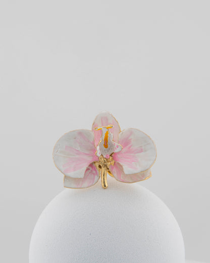 Handcrafted in Tuscany, the Marri Cortona Orchidea Ring in 18k gold bronze captures the orchid’s grace — unique, hand-enameled, and timelessly elegant.