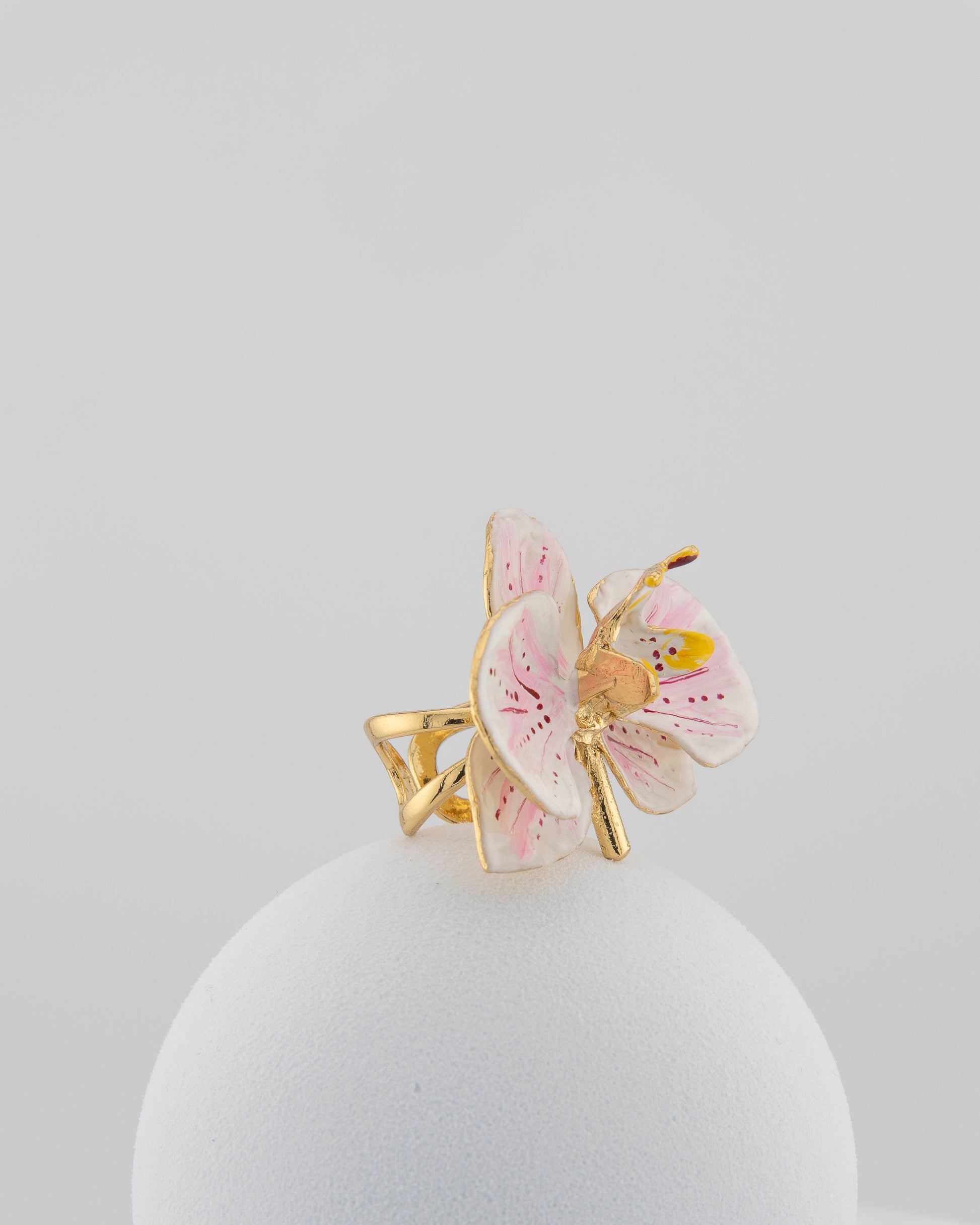 Handcrafted in Tuscany, the Marri Cortona Orchidea Ring in 18k gold bronze captures the orchid’s grace — unique, hand-enameled, and timelessly elegant.