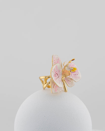 Handcrafted in Tuscany, the Marri Cortona Orchidea Ring in 18k gold bronze captures the orchid’s grace — unique, hand-enameled, and timelessly elegant.