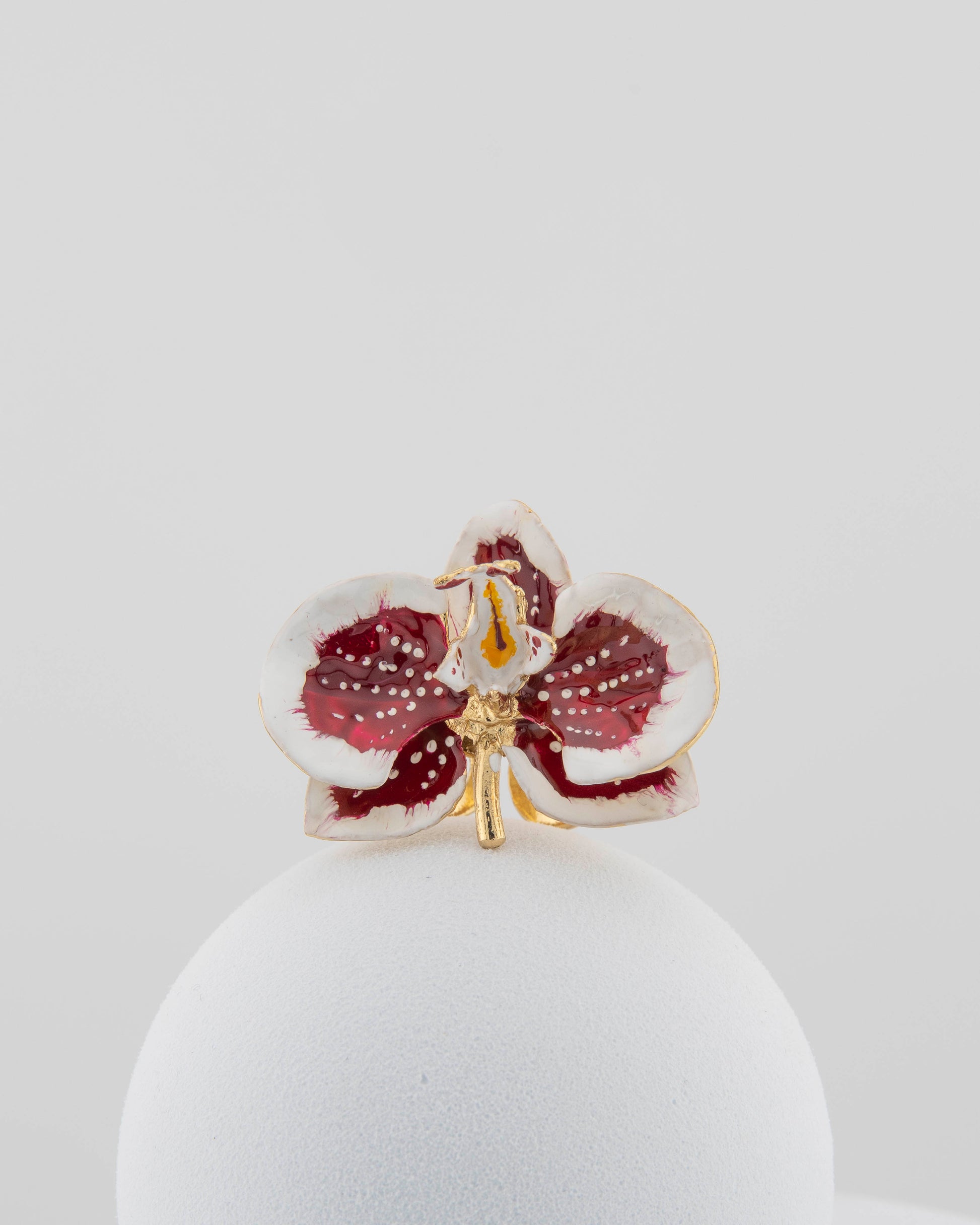 Handcrafted in Tuscany, the Marri Cortona Orchidea Ring in 18k gold bronze captures the orchid’s grace — unique, hand-enameled, and timelessly elegant.