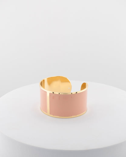 Handcrafted in Tuscany, the MarriCortona Smalto Bracelets in 18k gold and hand-painted enamel feature bold 30 mm bands — radiant, elegant, and uniquely Italian.